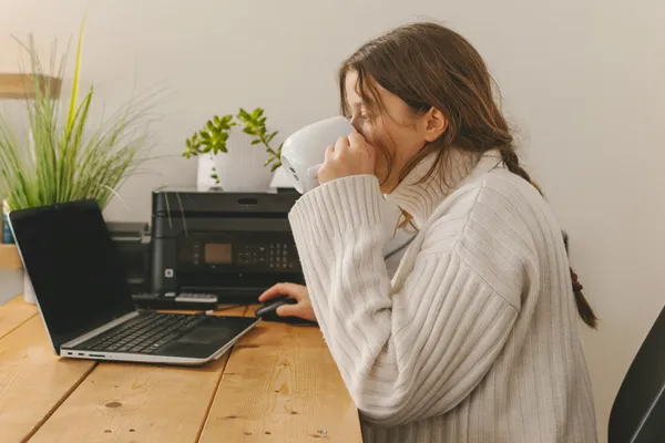 Woman browsing health information on laptop
